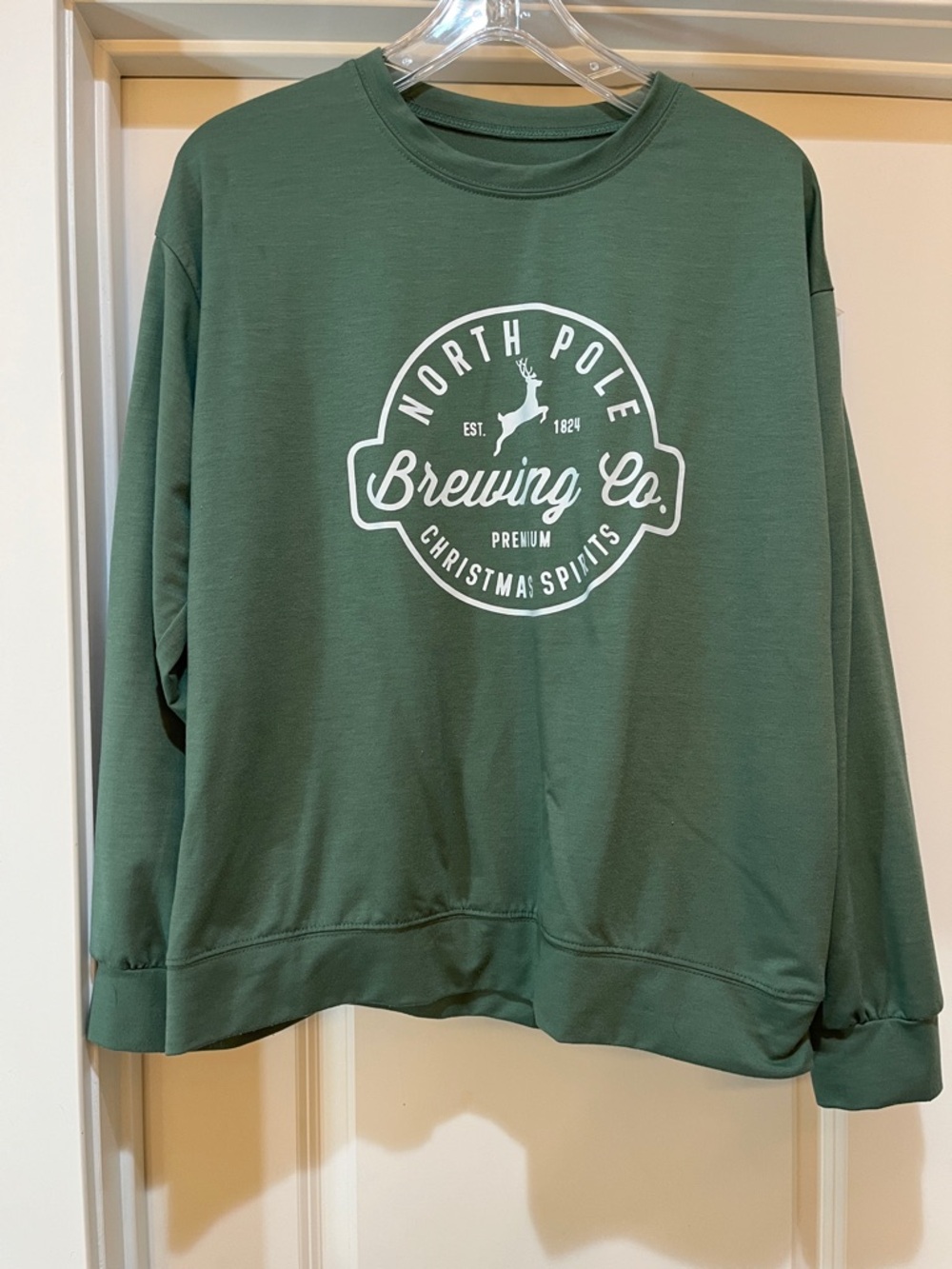 Amazon Green Long Sleeve Tee with White North Pole Brewing Co. Logo